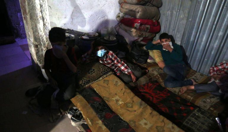 Víctimas del ataque en la ciudad siria de Douma.