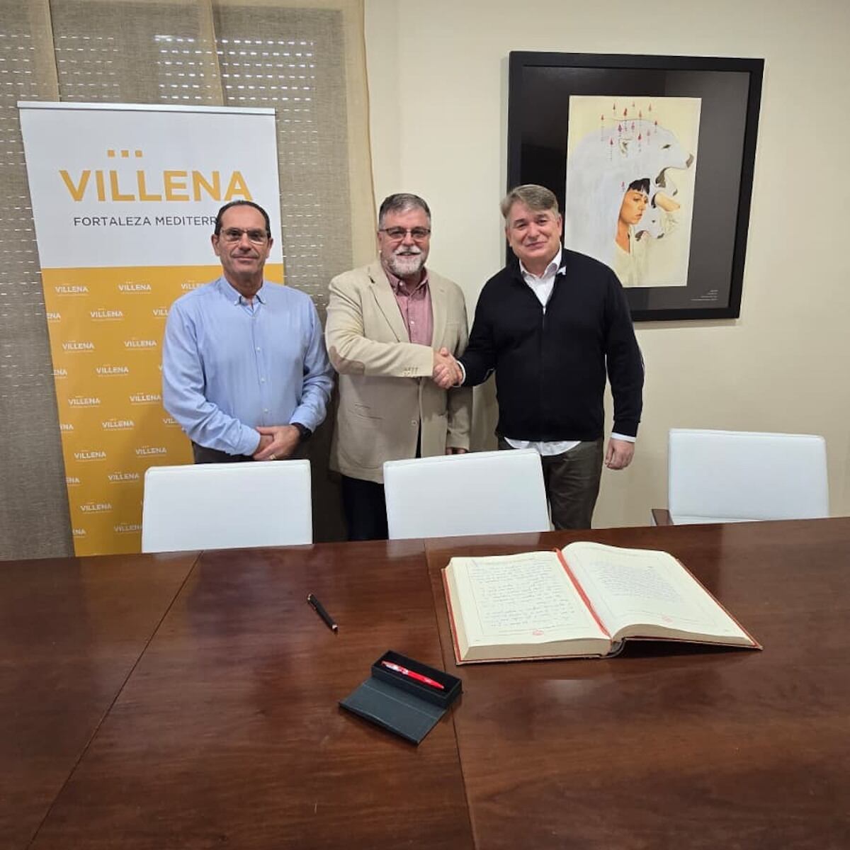 Firma del alcalde en el libro de honor de la Junta