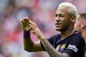 GIJON, SPAIN - SEPTEMBER 24: Neymar of FC Barcelona celebrates after scoring his team&#039;s third goal during the La Liga match between Real Sporting de Gijon and FC Barcelona at Estadio El Molinon on September 24, 2016 in Gijon, Spain. (Photo by Juan Manuel 