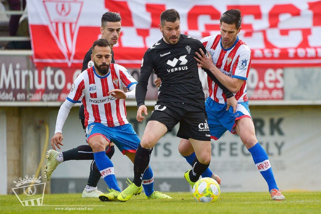 Choco junto a Benítez.