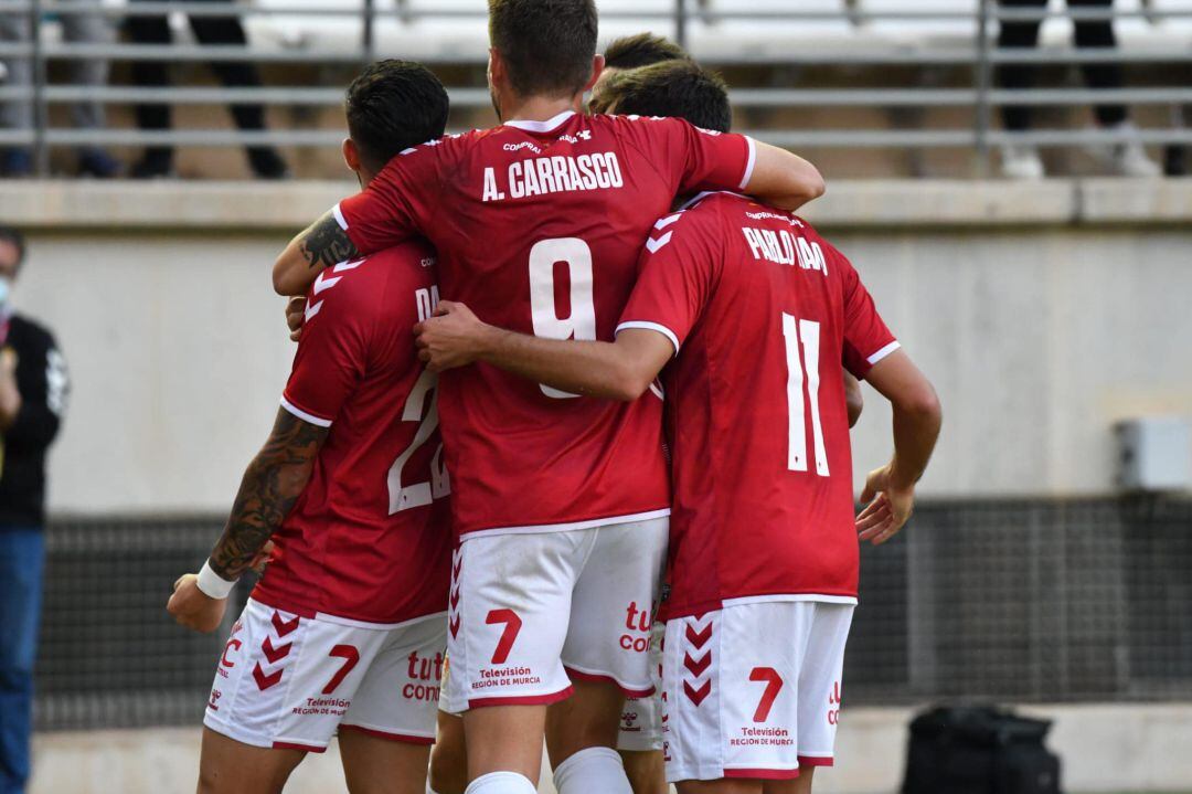 Andrés Carrasco, Pablo Haro y Dani García celebran un gol del Real Murcia