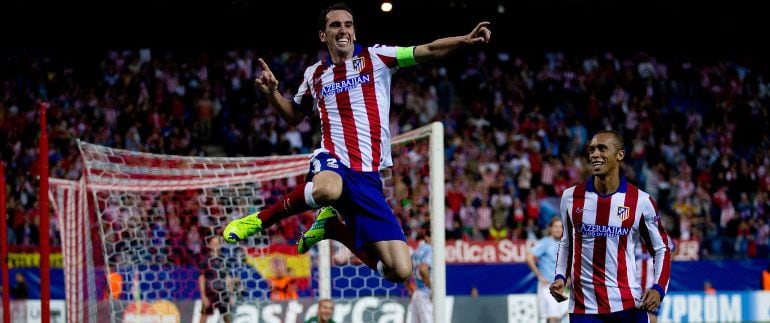 Los centrales del Atlético de Madrid Diego Godín y Joao Miranda.