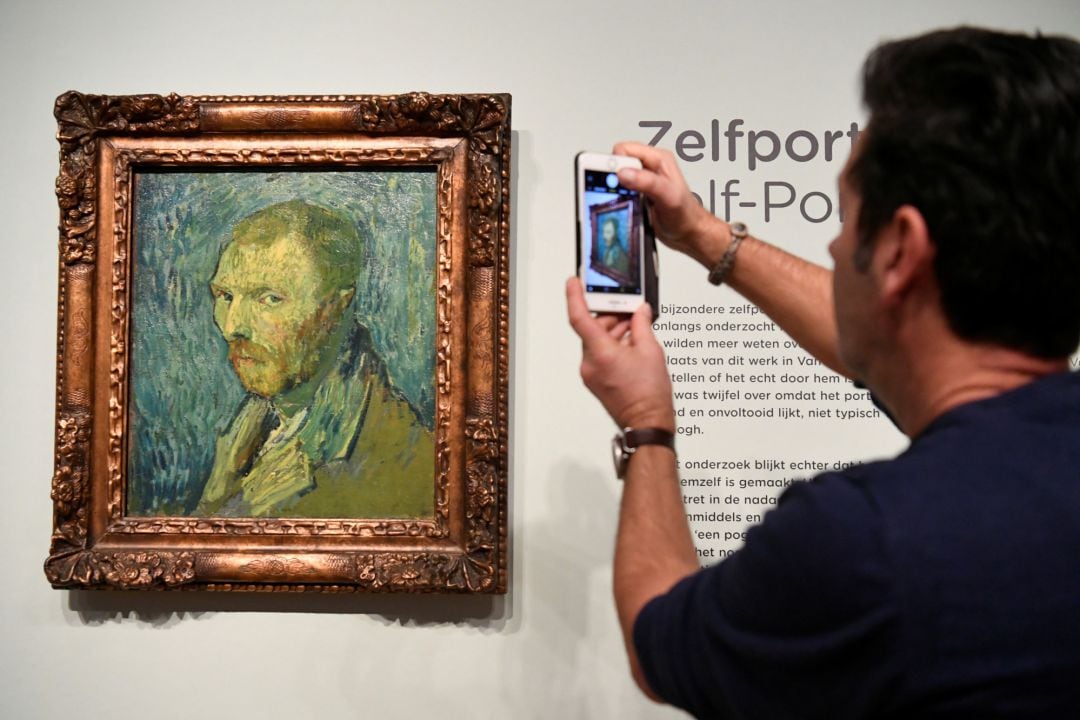 A man takes a picture of Dutch post-impressionist painter Vincent van Gogh&#039;s self portrait, painted during a psychotic episode, at the Van Gogh Museum in Amsterdam, Netherlands January 20, 2020