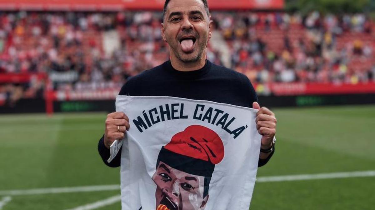 Michel amb pancarta de "Michel Català"