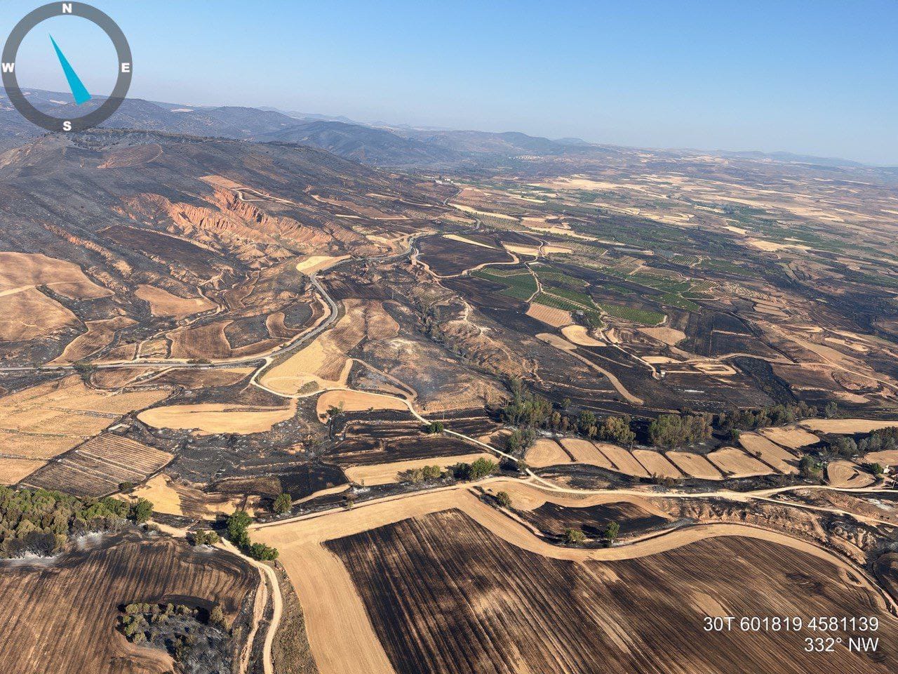 Imagen aérea del terreno abrasado por el incendio