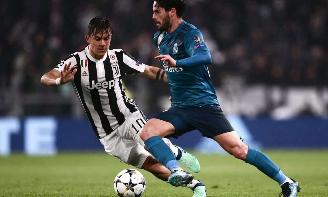 Paulo Dybala e Isco, en un partido entre la Juventus y el Real Madrid.