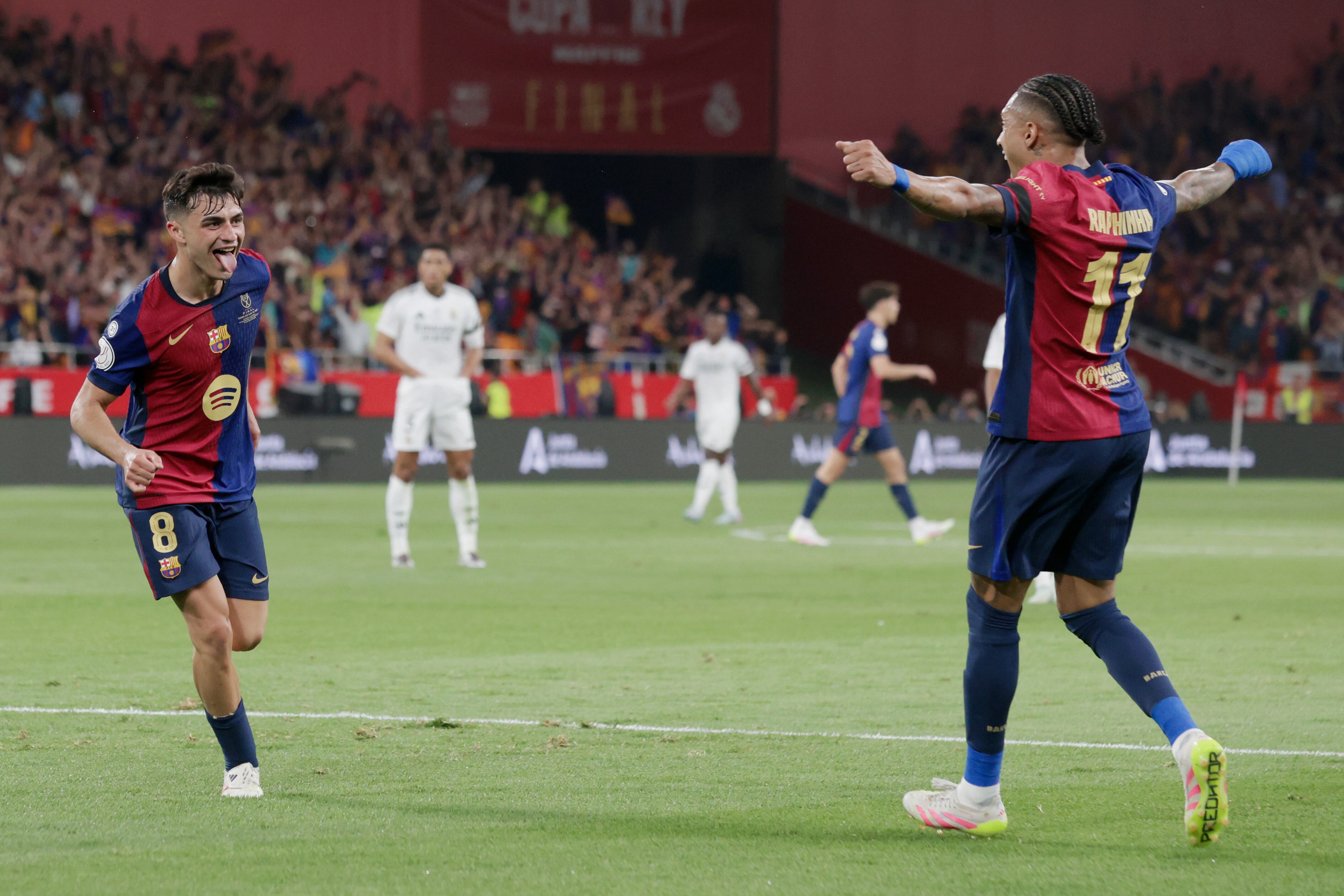 SEVILLA, SPAIN - APRIL 26: Pedri of FC Barcelona celebrates 1-0 with Raphinha of FC Barcelona  during the Spanish Copa del Rey  match between Real Madrid v FC Barcelona at the Estadio de la Cartuja on April 26, 2025 in Sevilla Spain (Photo by Eric Verhoeven/Soccrates/Getty Images)