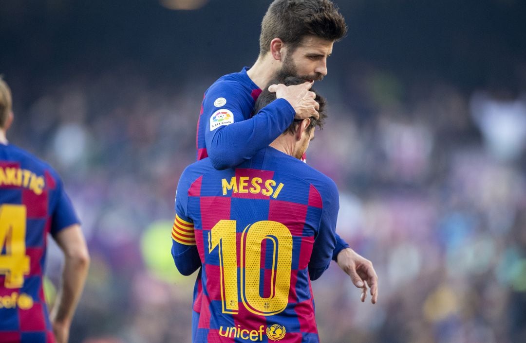 Gerard Piqué y Leo Messi celebrando un gol con el Barça