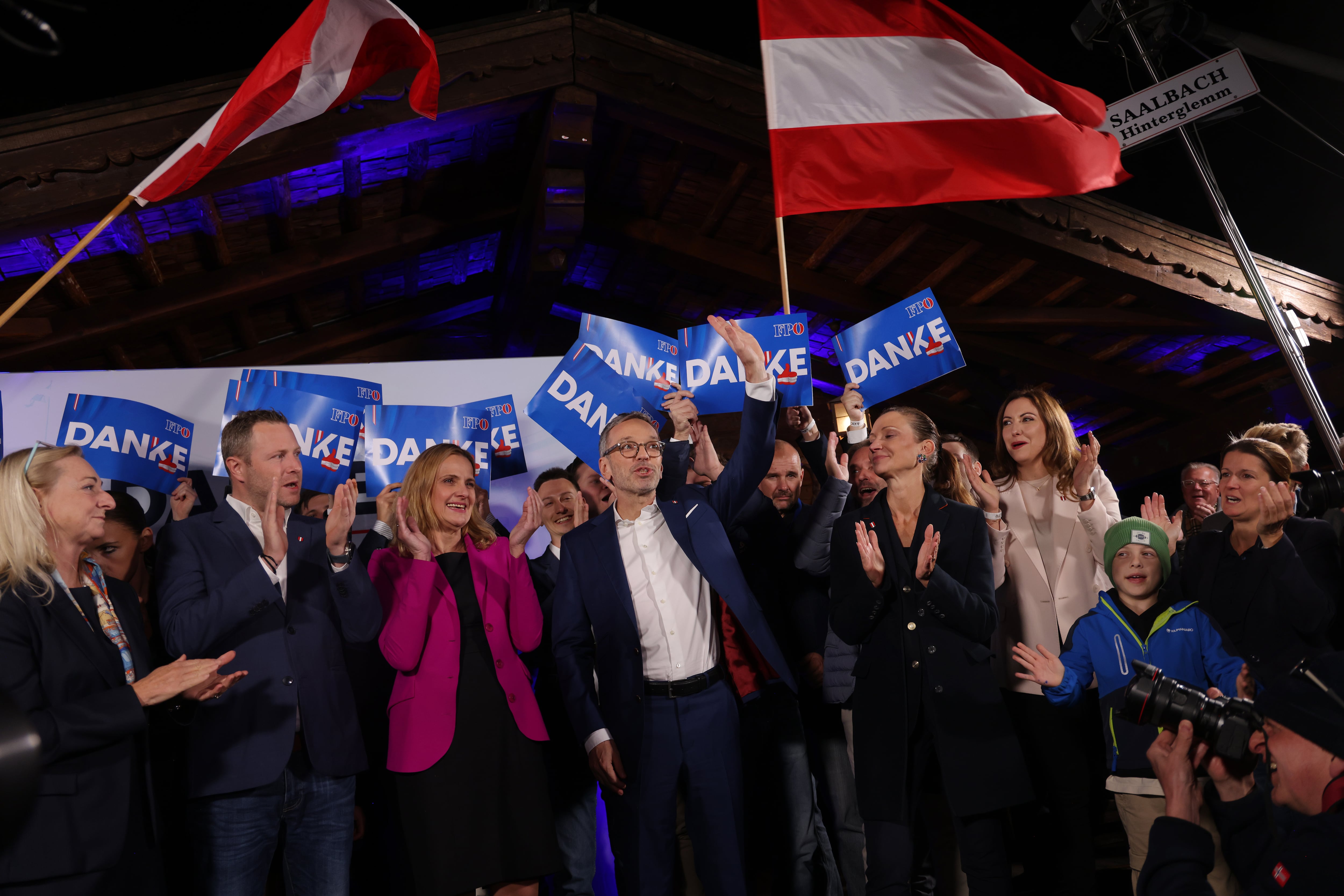 VIENNA, AUSTRIA - SEPTEMBER 29: Lead candidate of the far-right Freedom Party of Austria (FPOe) Herbert Kickl (C) celebrates with supporters at the FPOe election evening party following Austrian parliamentary elections on September 29, 2024 in Vienna, Austria. Initial election results show the far-right Freedom Party of Austria (FPOe) with approximately 29% in first place, with the Austrian People&#039;s Party (OeVP) of Chancellor Nehammer with approximately 26% in second place. (Photo by Sean Gallup/Getty Images)