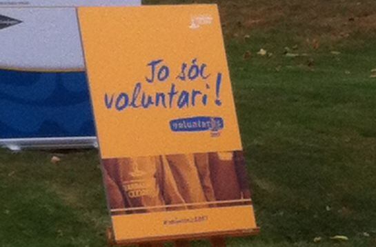 Cartell amb l'eslògan "Jo sóc voluntari"