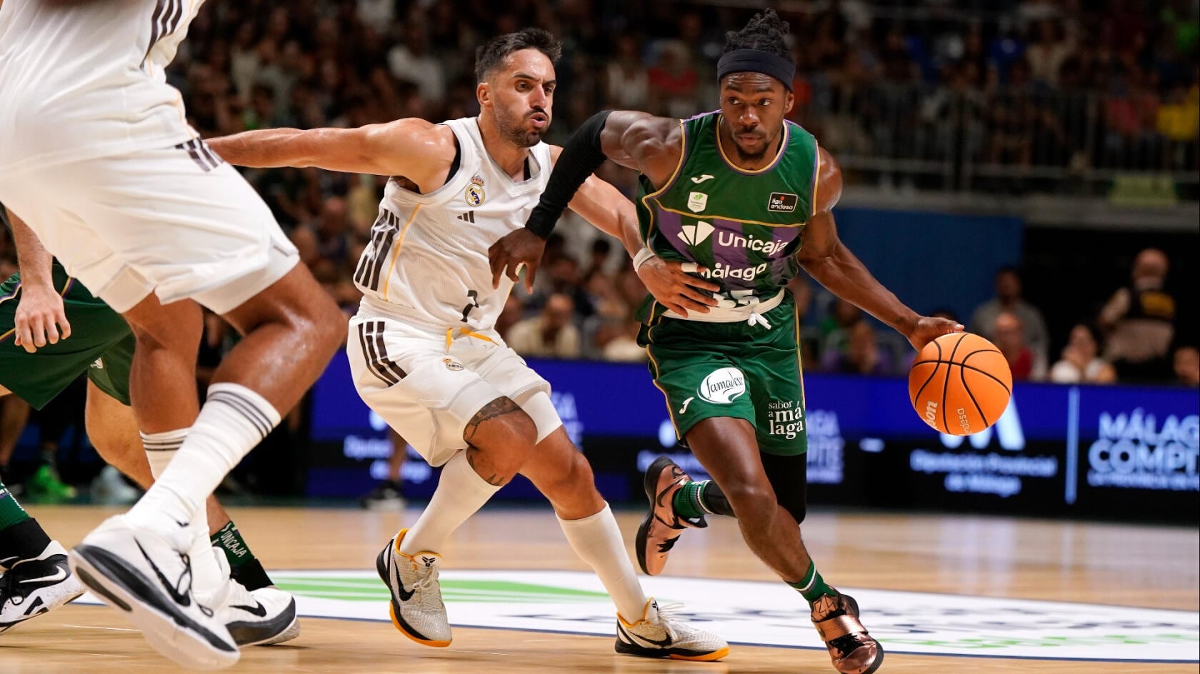 El base del Unicaja kendrick Perry, en un partido ante el Real Madrid en el Carpena