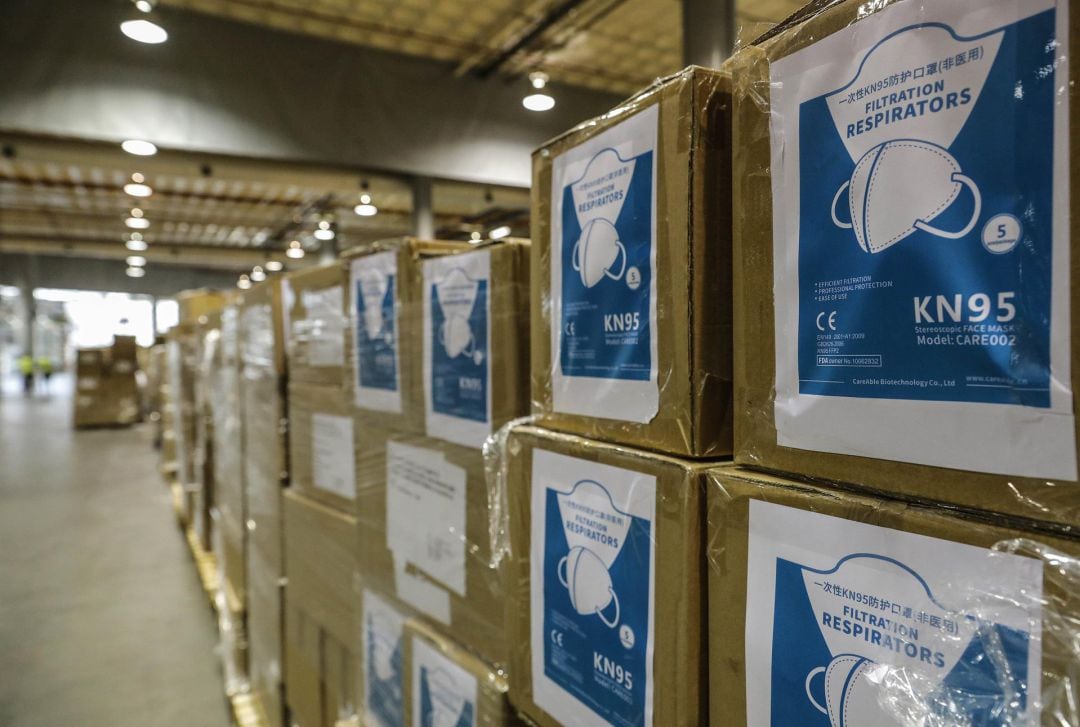 Cajas en el centro logístico de Feria Valencia que alberga material sanitario adquirido por la Comunitat Valenciana