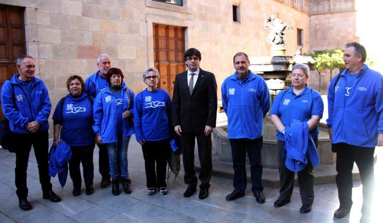 Imatge dels membres de la PDE al voltant del president de la Generalitat, Carles Puigdemont