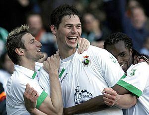 Balboa celebra un gol junto a Zigic y Rubén