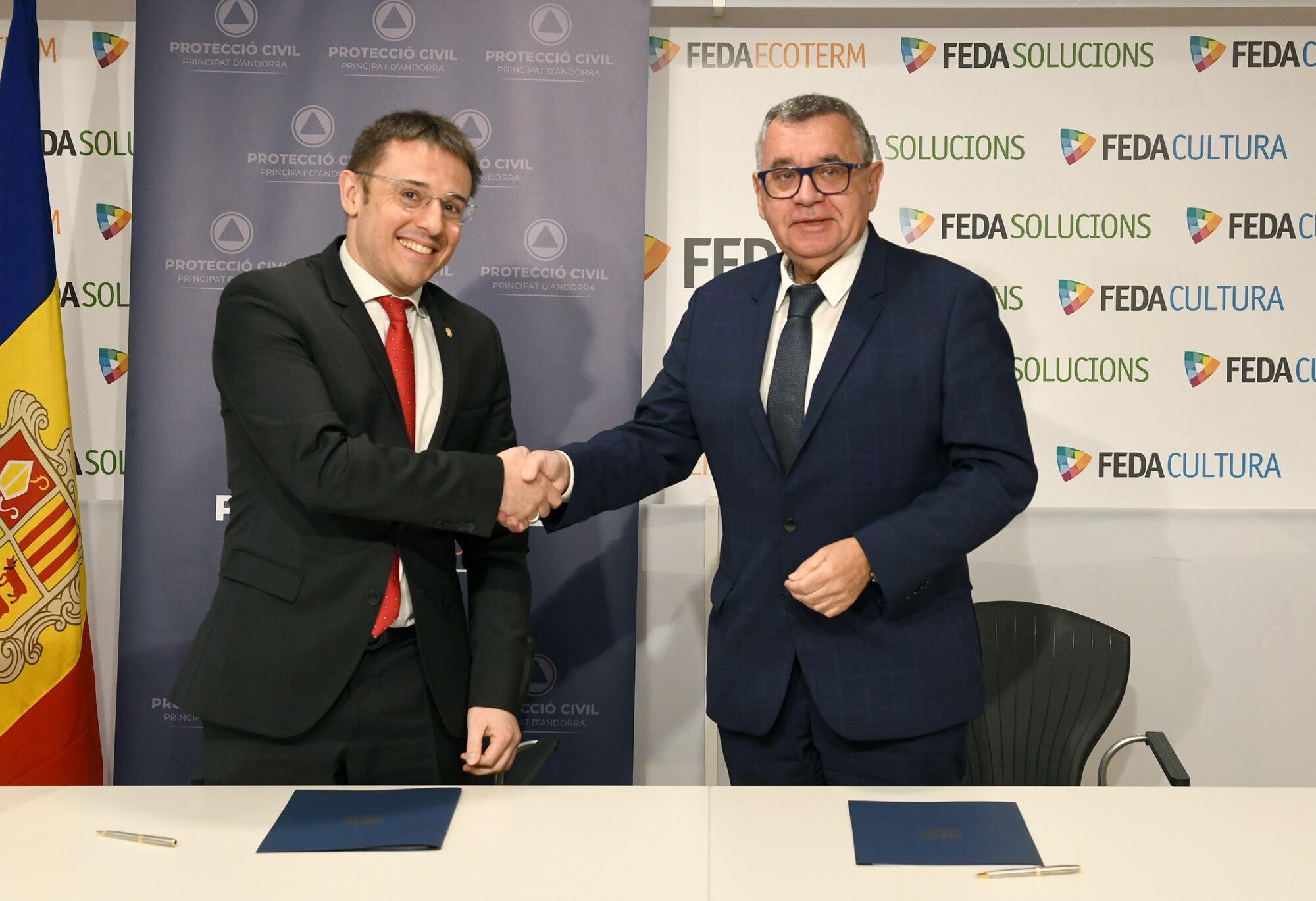 El secretari d'Estat de Justícia i Interior, Joan Antoni León i el conseller general de FEDA, Albert Moles.