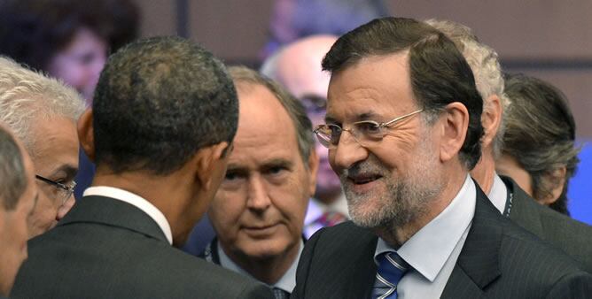 Rajoy saluda al presidente Barack Obama durante la cumbre de la Alianza Atlántica