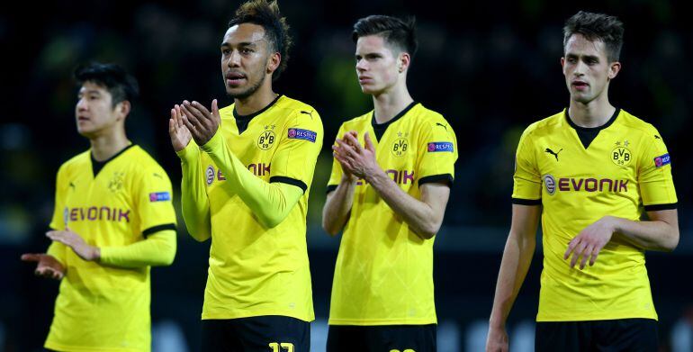 Park Joo Ho, Pierre-Emerick Aubameyang, Julian Weigl and Adnan Januzaj of Dortmund look dejected after the UEFA Europa League group C match between Borussia Dortmund and PAOK FC at Signal Iduna Park on December 10, 2015 in Dortmund, Germany. The match between Dortmund and PAOK FC ended 0-1