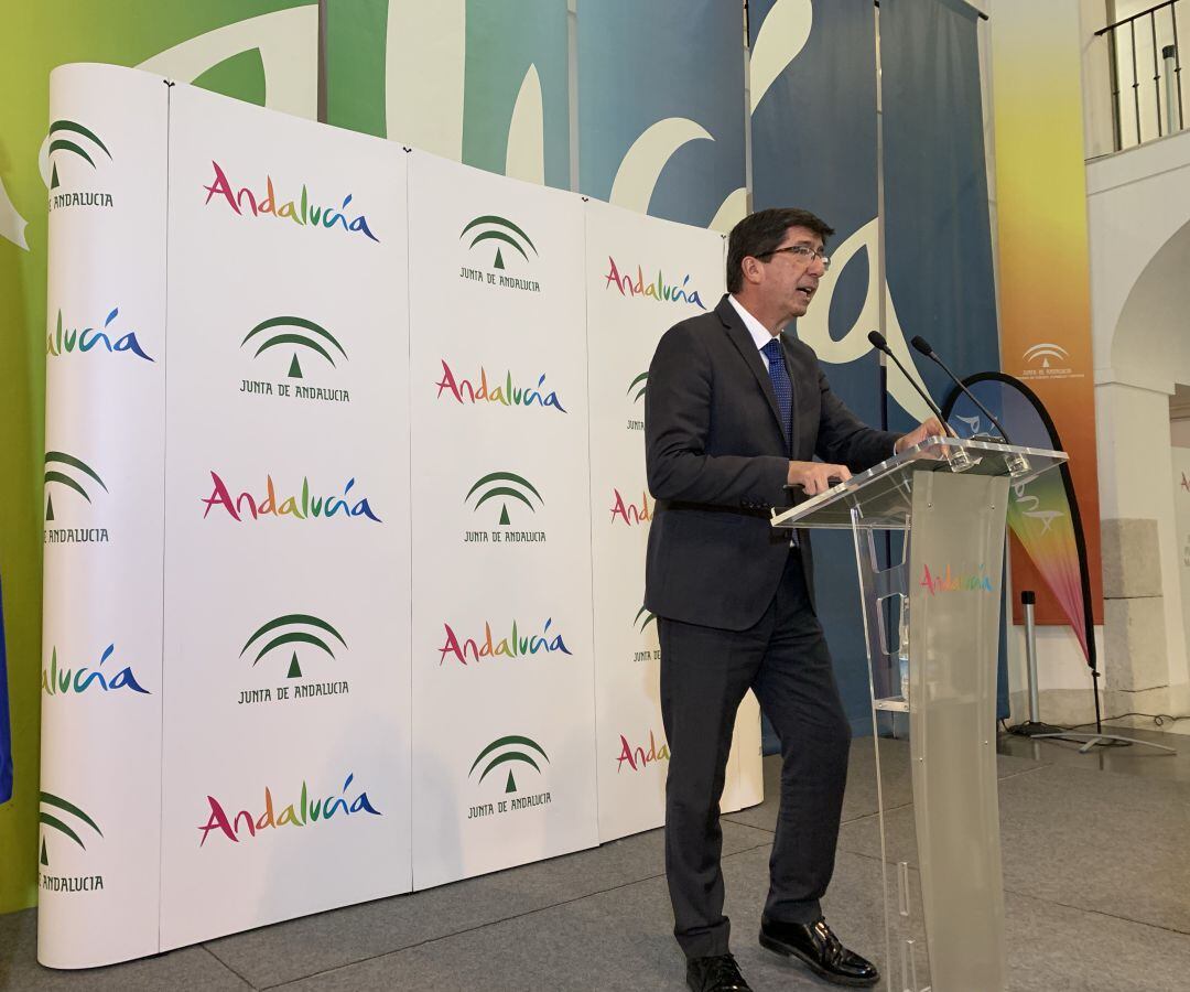 El consejero de turismo, Juan Marín, durante la presentación de la campaña de promoción de Andalucía en verano