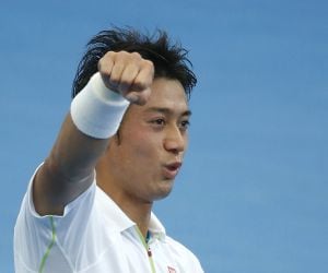 Kei Nishikori of Japan celebrates his win against Bernard Tomic of Australia in their men&#039;s singles quarter final at the Brisbane International tennis tournament in Brisbane, January 9, 2015. REUTERS/Jason Reed (AUSTRALIA - Tags: SPORT TENNIS)