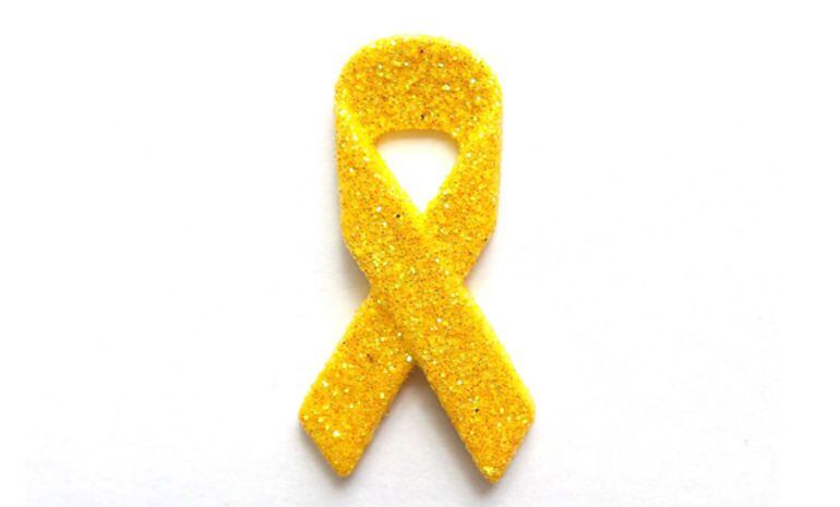 Lazo amarillo, representativo del Cáncer Infantil