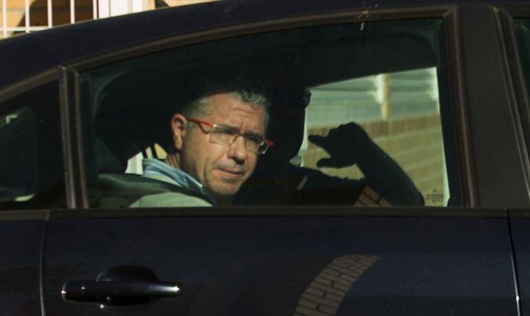 MADRID, SPAIN - OCTOBER 27: Francisco Granados, former Popular Party senator and deputy first minister of Madrid leaves his house in a police car after being arrested along with dozens of other politicians accross Spain in an anti-fraud operation on Octob