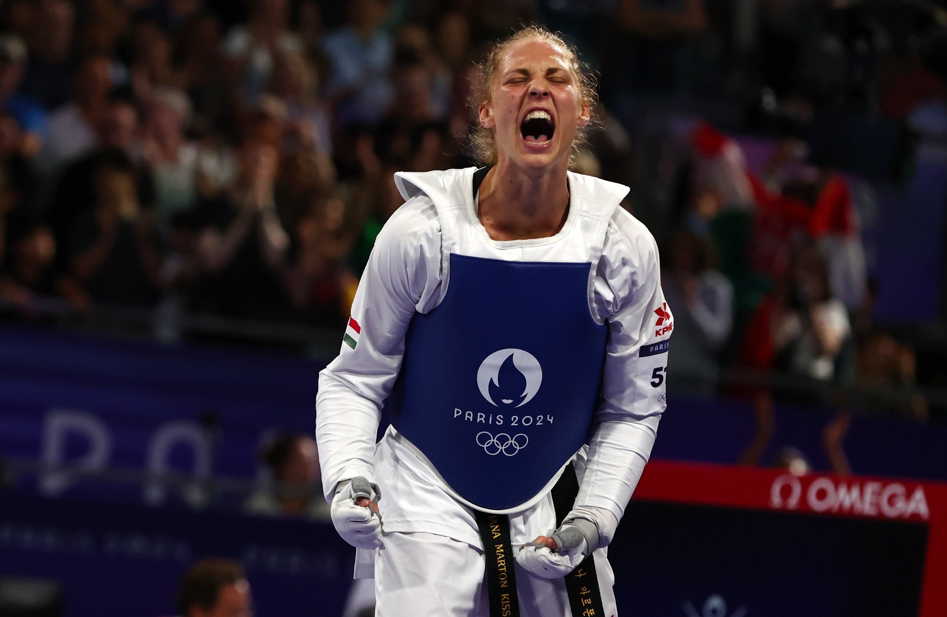 Viviana Marton of Hungary celebrates defeating Aleksandra Perisic EFE/EPA/DIVYAKANT SOLANKI