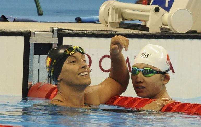 La aragonesa Teresa Perales, junto a china Xu Xhian, que consiguó el oro. 