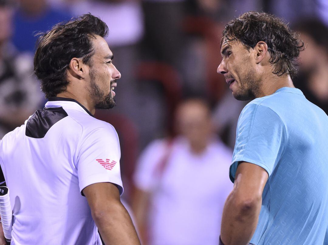 Fognini, en un partido con Rafa Nadal.