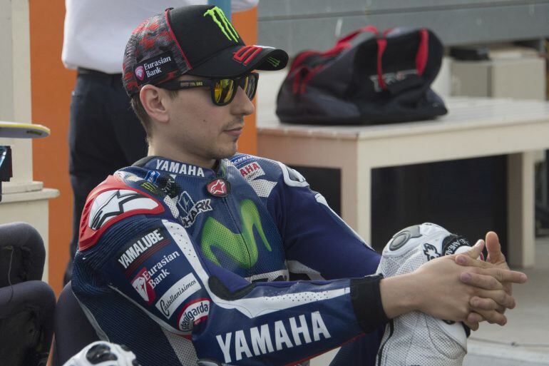 DOHA, QATAR - MARCH 17:   Jorge Lorenzo of Spain and Movistar Yamaha MotoGP looks on before the official photo of the 2016 MotoGP riders during the MotoGp of Qatar - Free Practice at Losail Circuit on March 17, 2016 in Doha, Qatar.  (Photo by Mirco Lazzar