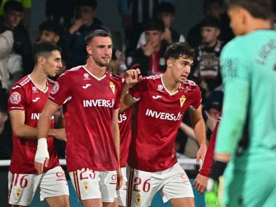 El Real Murcia celebra un gol en el Cartagonova: Antonio David, David Flakus y Héctor Pérez.