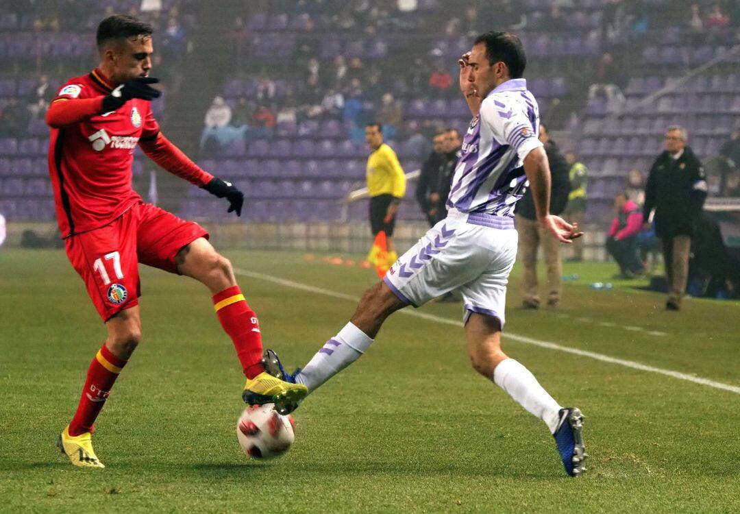 Nacho Martínez y Robert Ibáñez, durante el partido