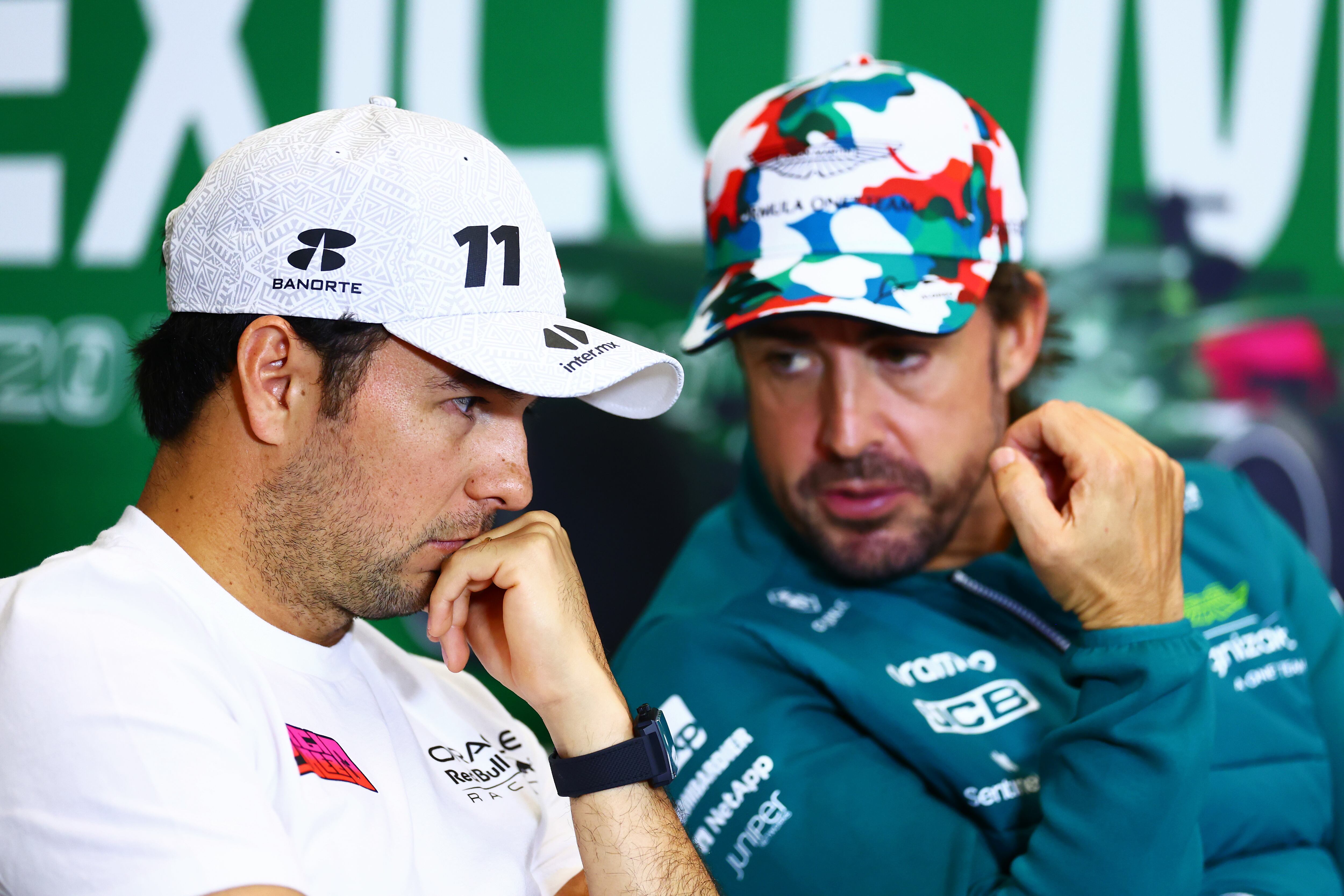 Sergio Pérez y Fernando Alonso, durante la rueda de prensa previa al GP de México