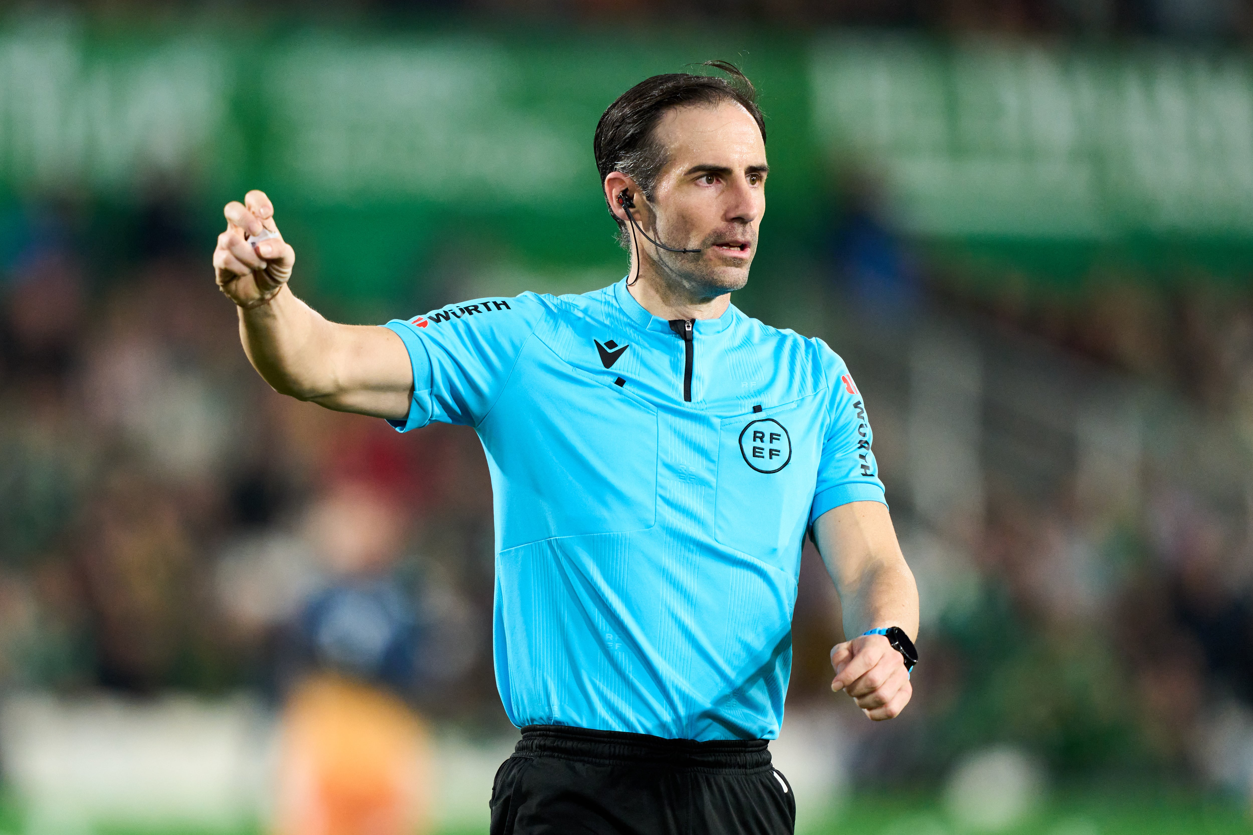 SANTANDER, SPAIN - FEBRUARY 13: Referee Jon Ander Gonzalez Esteban reacts during the LaLiga Smartbank match between Racing Santander and CD Leganes at El Sardinero stadium on February 13, 2023 in Santander, Spain. (Photo by Juan Manuel Serrano Arce/Getty Images)