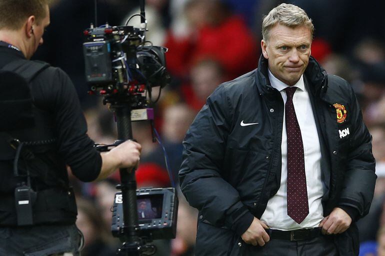 Then Manchester United&#039;s manager David Moyes reacts after losing to Newcastle United in their English Premier League soccer match at Old Trafford in Manchester, northern England, in this December 7, 2013 file photo. Moyes, who has only been in charge of M