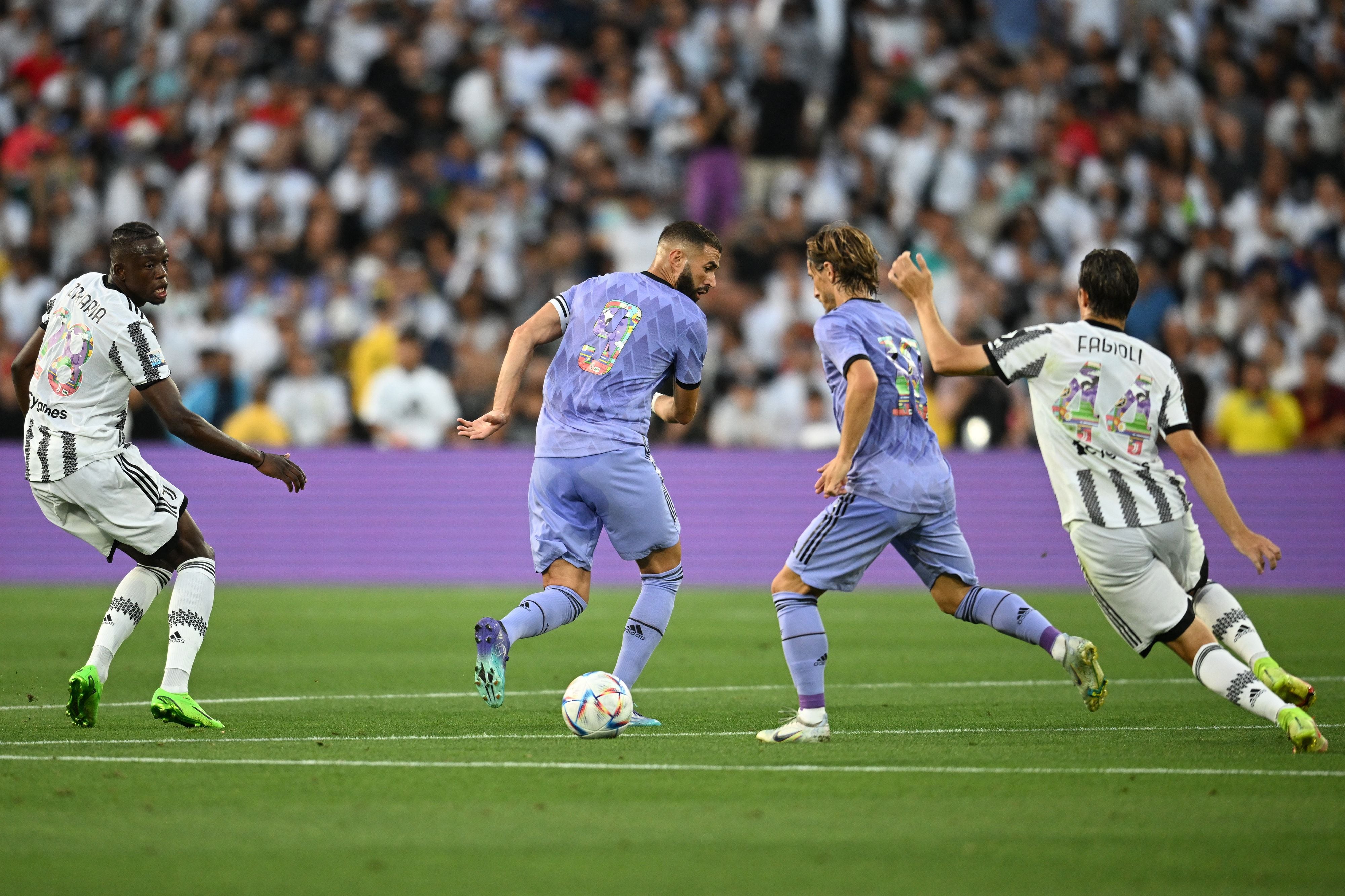 Karim Benzema y Luka Modric, durante el encuentro amistoso ante la Juventus.