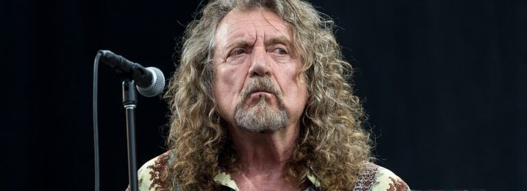 GLASTONBURY, ENGLAND - JUNE 28: Robert Plant performs on the Pyramid Stage during day 2 of the Glastonbury Festival at Worthy Farm on June 28, 2014 in Glastonbury, England.