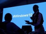 A waitress serves a Microsoft delegate during the launch of the Windows 10 operating system in Kenya&#039;s capital Nairobi, July 29, 2015. Microsoft Corp&#039;s launch of its first new operating system in almost three years, designed to work across laptops, deskto