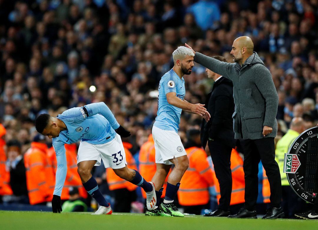 Gabriel Jesus, Agüero y Guardiola, durante un encuentro