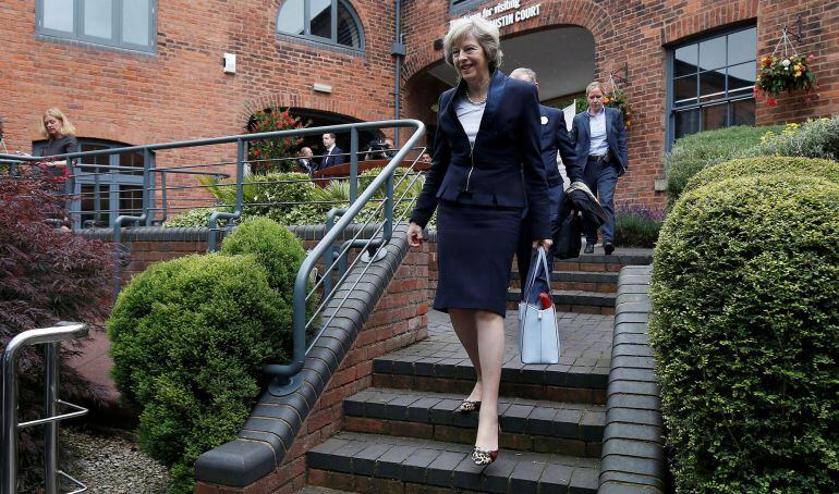 Theresa May, cuando era ministra del Interior, llegando a un acto