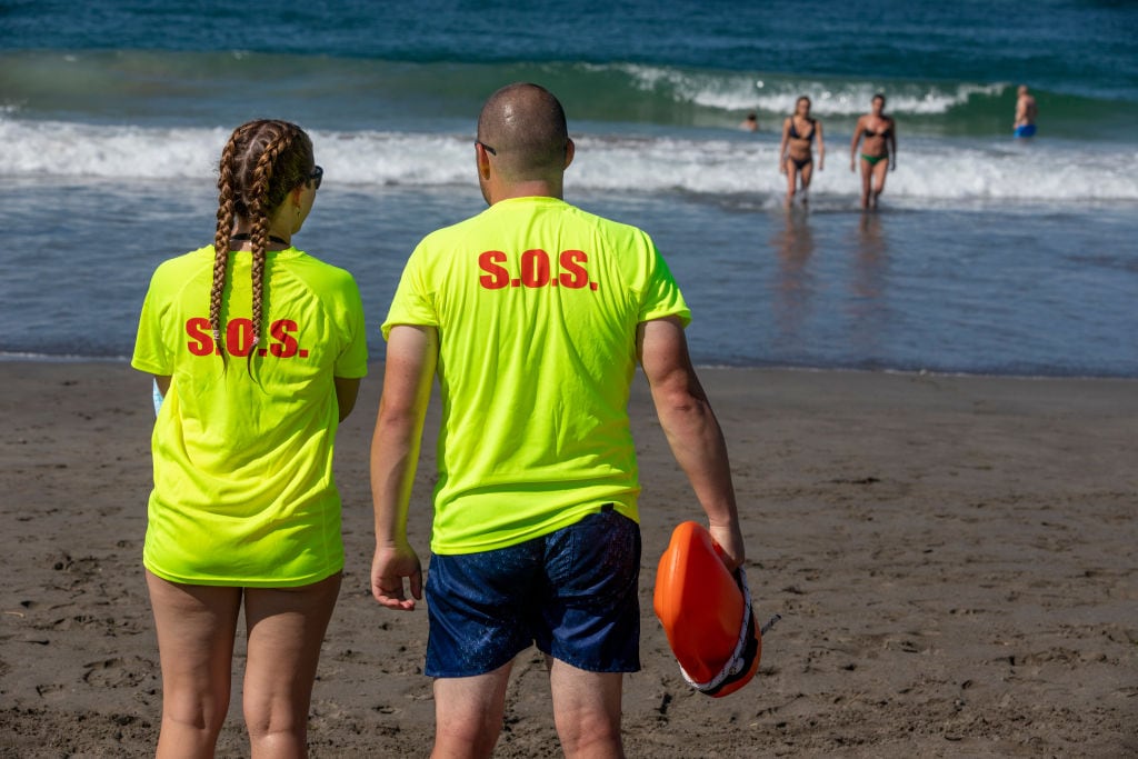 ORTIGUEIRA SPAIN - JULY 18: Rescue team on the beach of Morouzos in the Rias Altas region,seen on July 18, 2020, Ortigueira, Galicia, Spain. (Photo by Xurxo Lobato / Getty Images)