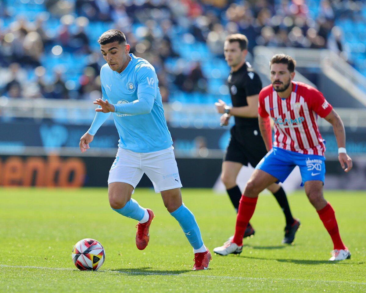 Un lance del partido