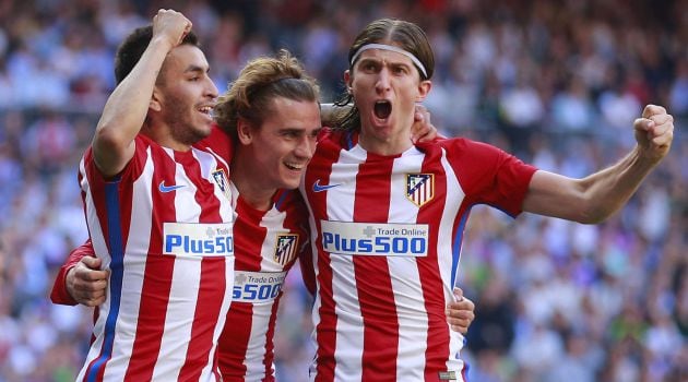 Griezmann celebra su gol con Correa y Filipe Luis.