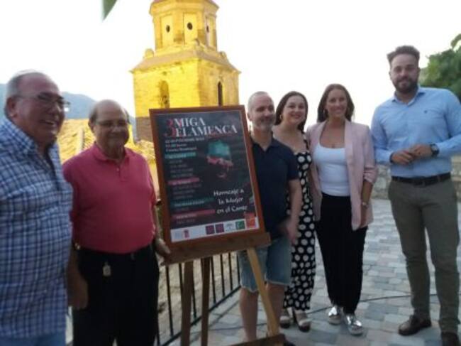 Presentación del cartel con la iglesia de la Asunción de fondo