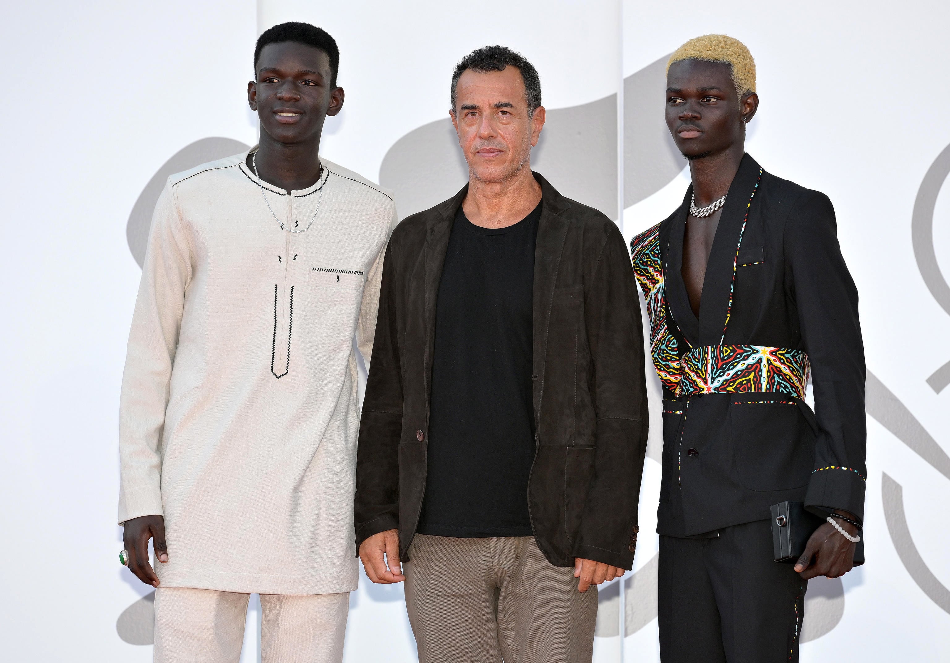 Venice (Italy), 06/09/2023.- Italian director Matteo Garrone (C) with actors and cast members Moustapha Fall (R) and Seydou Sarr (L) arrive for the premiere of &#039;Io Capitano&#039; (Me Captain) during the 80th Venice Film Festival, in Venice, Italy, 06 September 2023. The movie is presented in the official competition &#039;Venezia 80&#039; at the festival running from 30 August to 09 September 2023. (Cine, Cine, Italia, Niza, Venecia) EFE/EPA/ETTORE FERRARI
