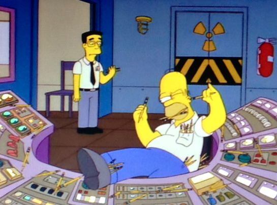 Frank Grimes junto a Homer Simpson.