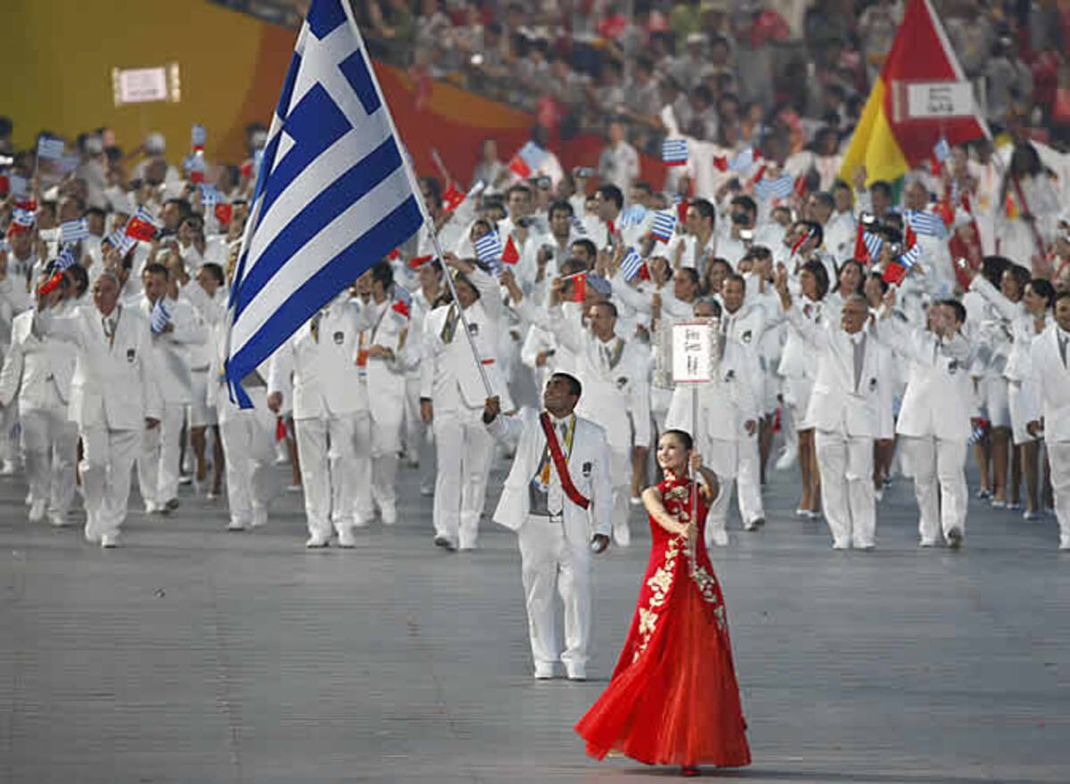 La delegación griega en su desfile en 'El Nido' de Pekín.