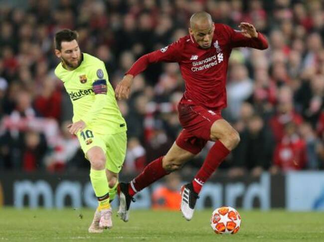 Fabinho, del Liverpool y Messi, del Barça, durante un partido de semifinales de la Champions el 7 de mayo de 2019.