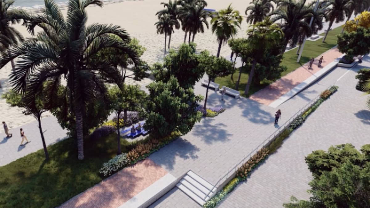 Parterres ajardinados y decenas de árboles para generar sombra en un tramo del paseo marítimo de Gandia